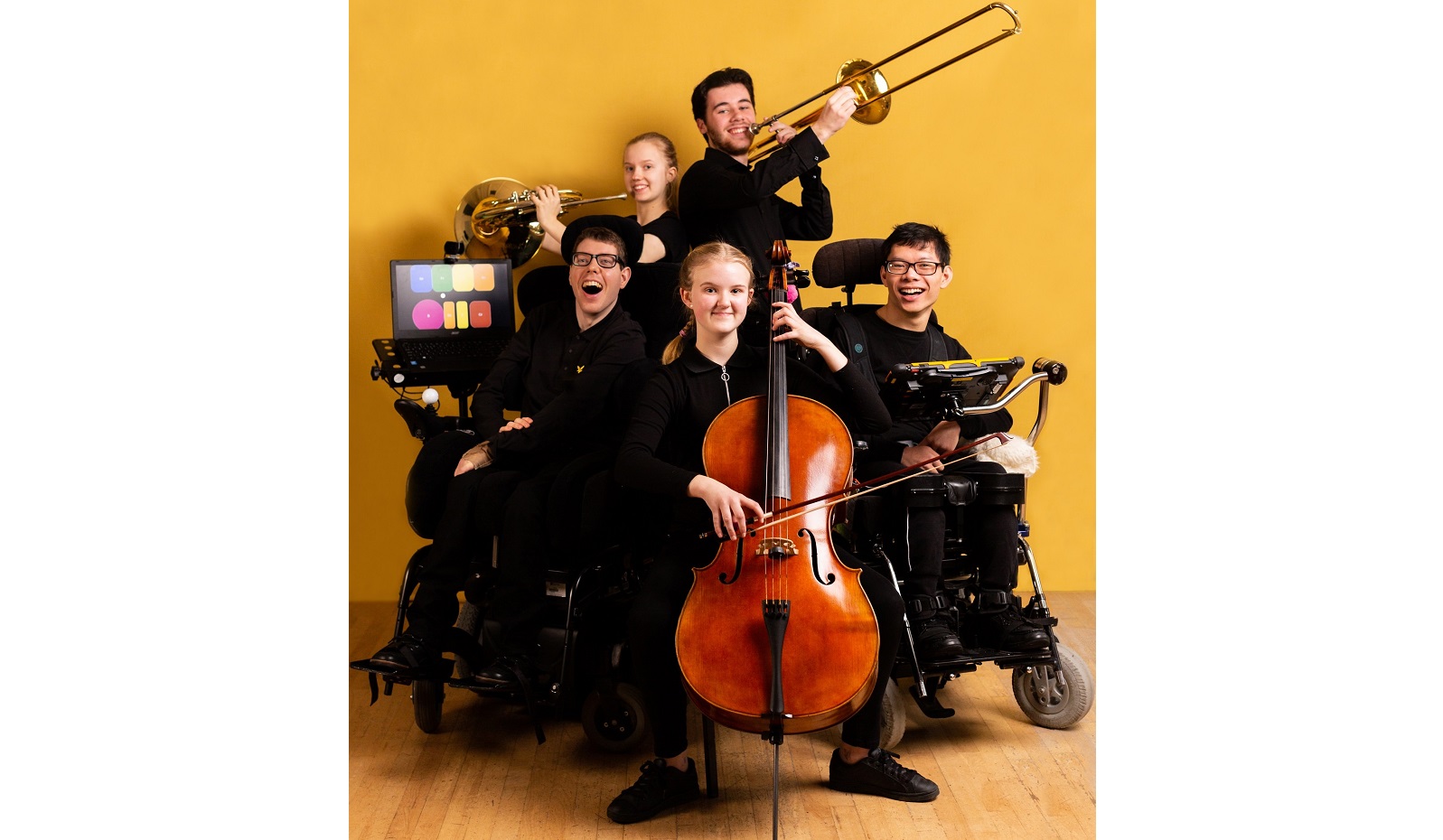 National Open Youth Orchestra musicians playing brass, string and electronic instruments. Two Clarions are shown on the picture.